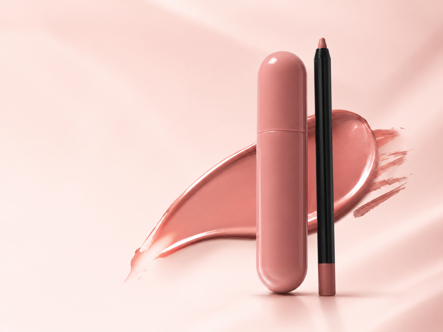 Lip liner and hydrating lip color duo with a rosy nude texture smear